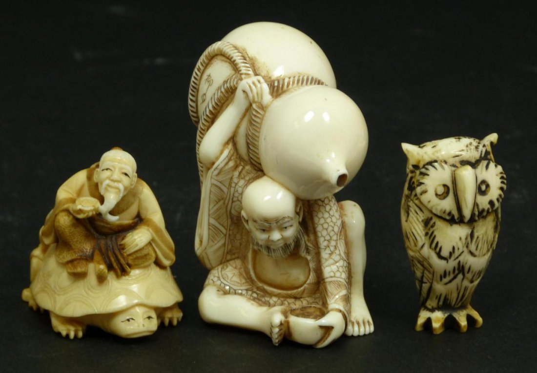 3PCS CHINESE CARVED IVORY NETSUKE FIGURES: Lot of three Japanese carved ivory Netsuke figures including an owl, a wise man on a turtle, and a seated man carrying a large Hulu gourd on his back. Each piece is signed. Meiji to Showa. Largest mea