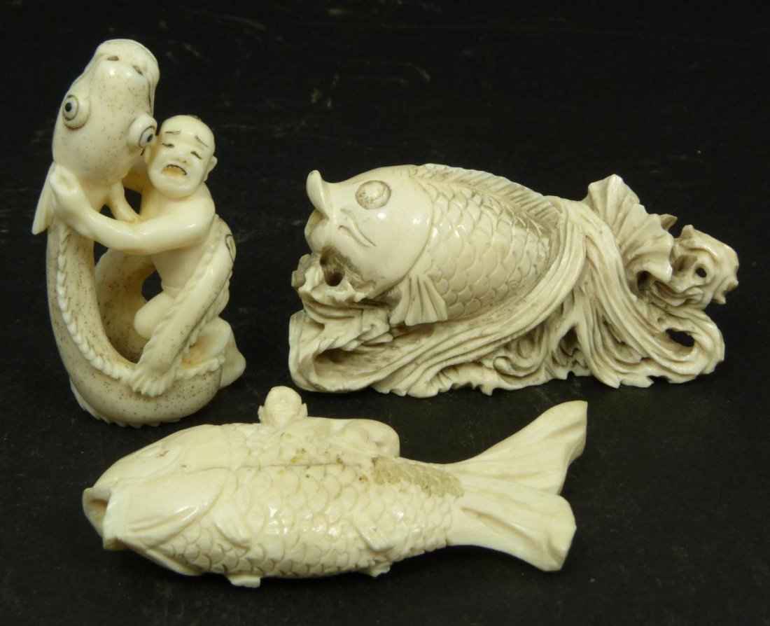 LOT OF 3 JAPANESE CARVED IVORY FISH SCULPTURES: Lot of three Japanese carved ivory figures depicting fish and netsuke man with eel. Each approx. measures 2 3/4in Height. Total weight 89g.