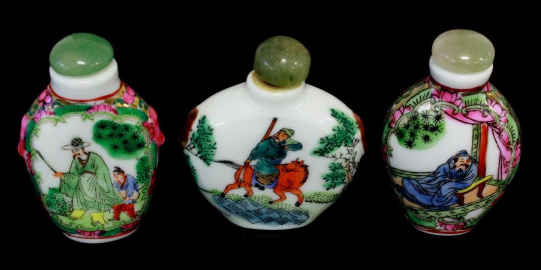 LOT OF 3 CHINESE PORCELAIN SNUFF BOTTLES: A lot of three Chinese hand painted enameled porcelain snuff bottles. Each depicting wise men and warriors. Each hold three character calligraphy marks to bottom. Tallest 2 7/8" height (6.9cm). Total 