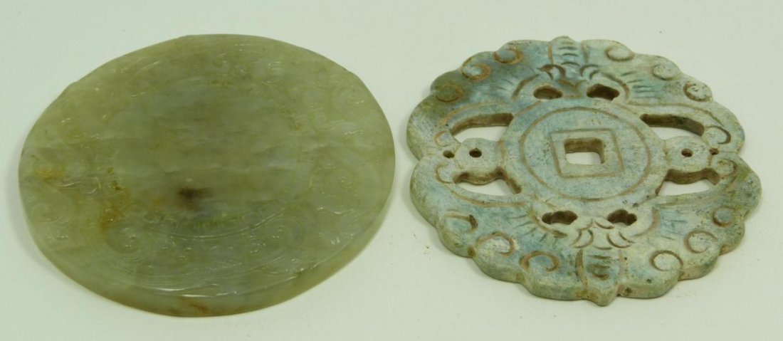 CHINESE CARVED JADE INK STONE & PENDANT: One Chinese carved light green Jade pendant decorated in Ming Dynasty style with bat and coin motif signifying good luck, measures 3" diameter (7.62cm). One Chinese, Qing Dynasty pale green celadon Ja