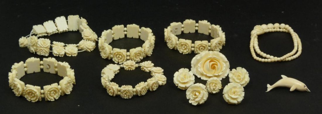 13pc CHINESE CARVED IVORY JEWELRY SUITE: Lot includes five floral bracelets, a rose form pin, a dolphin pin, five rose earrings, and a beaded necklace. Total weight 150g.