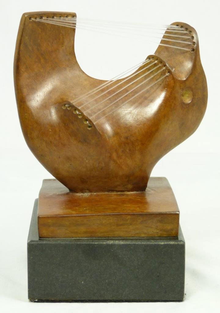 HENRY MOORE 'STRINGED' BRONZE SCULPTURE: Bronze sculpture depicting an abstract stringed instrument after Henry Moore (BRITISH, 1898-1986). Titled 'Stringed'. Mounted on black marble base. Brown patina. Signed to bronze base. Measures 5 1/2"