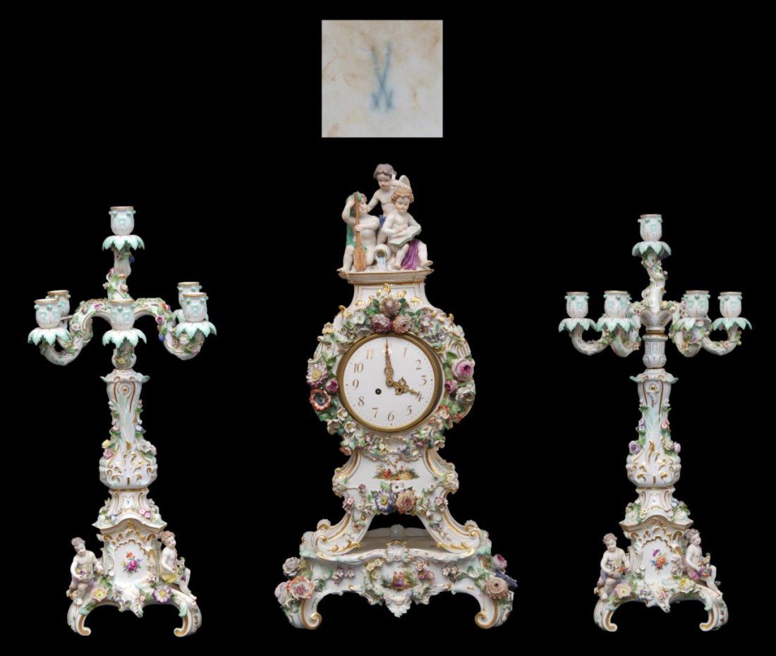 19th C. MEISSEN PORCELAIN GARNITURE CLOCK SET: A German polychrome porcelain Meissen mantel clock garniture set, circa mid to late 19th century. The countwheel bell striking anchor movement signed Lenzkirch, 2 Million - 3821. Polychrome and gilt r