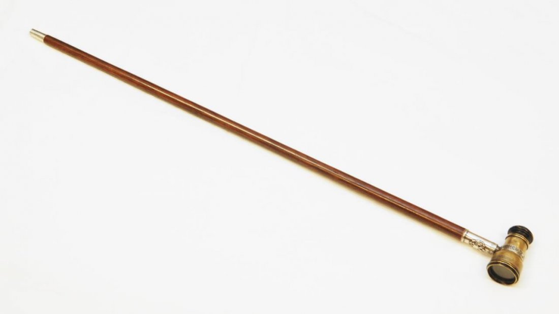 RUSSIAN SILVER & BRASS SPYGLASS CANE: Russian silver and brass spyglass cane having applique double headed eagle design. Holds impressed Assayer mark, 84 silver purity mark, town marks and workmaster marks. Measures 38 3/4" length (98.4cm