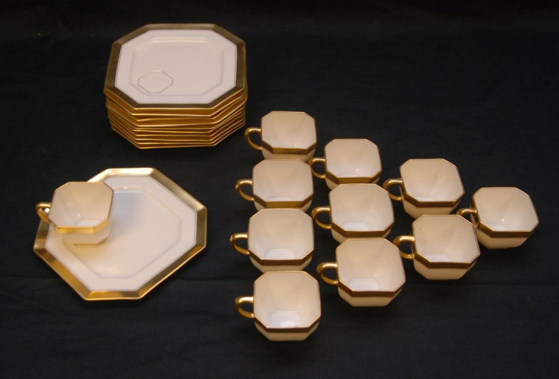 11 LENOX CAKE UNDERPLATE & TEACUP SETS: 11 Lenox porcelain teacup and cake under plate sets totaling 22 pieces. Each having an octagonal shape with ivory and gilt band design. Each holds green lenox mark to bottom. Cups measure 2" height (5