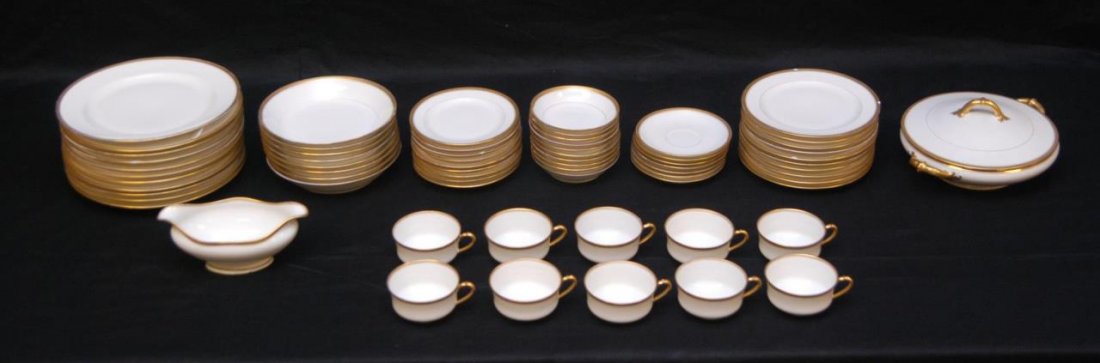 67 PIECE HAVILAND LIMOGES GILT RIM CHINA SET: Antique 67 piece Haviland Limoges China set having a gilded design to rim with diamond pattern over white glazed ground. Set includes 11 dinner plates (9 3/4"), 10 salad plates (7 1/2"), 9 bread & but
