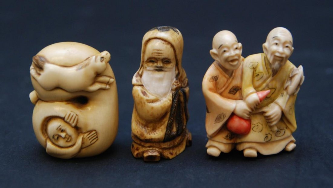 LOT OF THREE JAPANESE CARVED IVORY NETSUKE: A lot of three Japanese hand carved ivory netsuke figures. One depicting a hulu double goud with leaping horse and hiding man, the next a polychromed wise man with hooded robe and lastly a polychromed