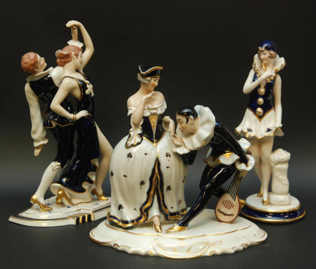 3 ROYAL DUX PORCELAIN FIGURES #'S 3000/3120/3250: A pair of Royal Dux Bohemian porcelain figures. Lot includes an Art Deco woman #3000 I 4, dancing couple #3250 and pierrot with woman #3120/I 4. Both figures early to mid 20th century. Each piece hold