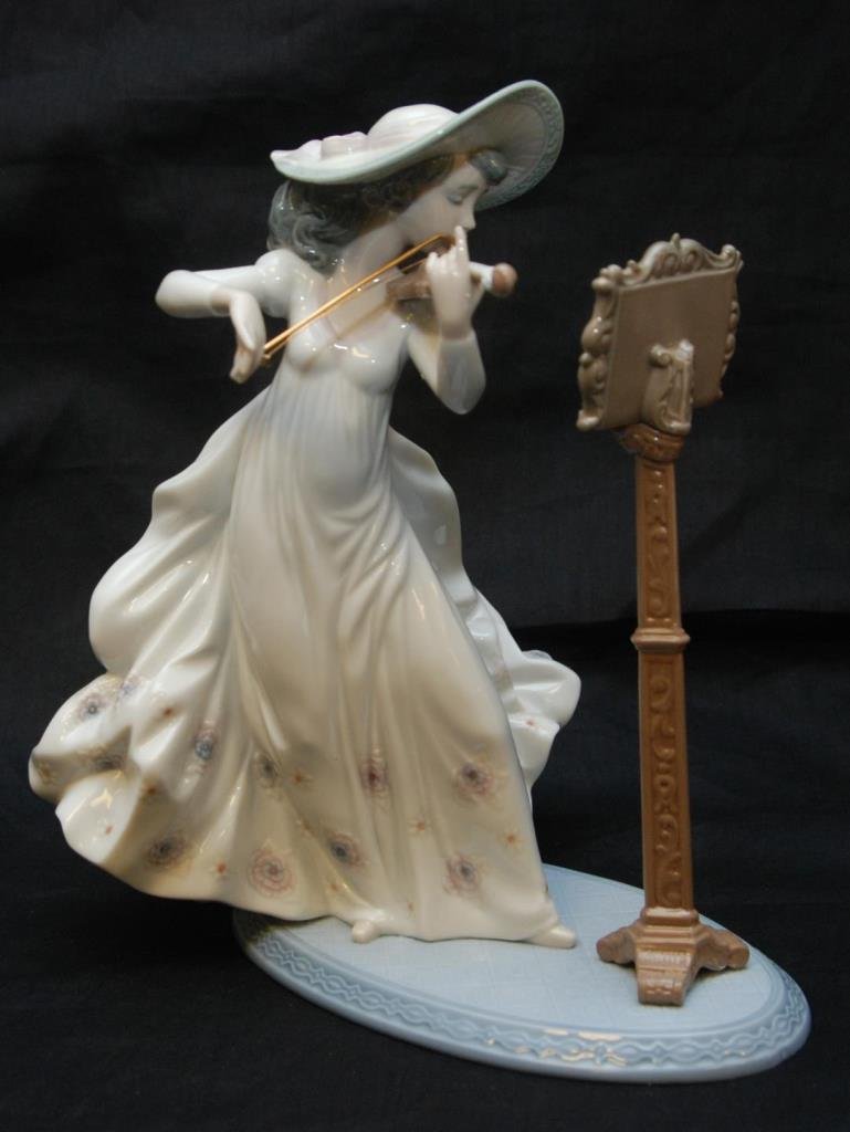 LLADRO PORCELAIN SCULPTURE 'SWEET SYMPHONY': Spanish Name: Leccion de Violin Sculptor: Regino Torrijos Last Retail: $465.00 Finish: Glazed Year Issued: 1996 Height (in): 9.50 Year Retired: 2004 Width (in): 8.75