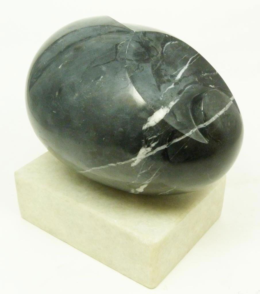 BRANCUSI MARBLE SCULPTURE WITH MARBLE BASE: After Constantin Brancusi (ROMANIAN, 1876-1957) marble sculpture having a white marble base. Signed to side and dated 1929. Measures approx. 7 1/2" length (19cm).