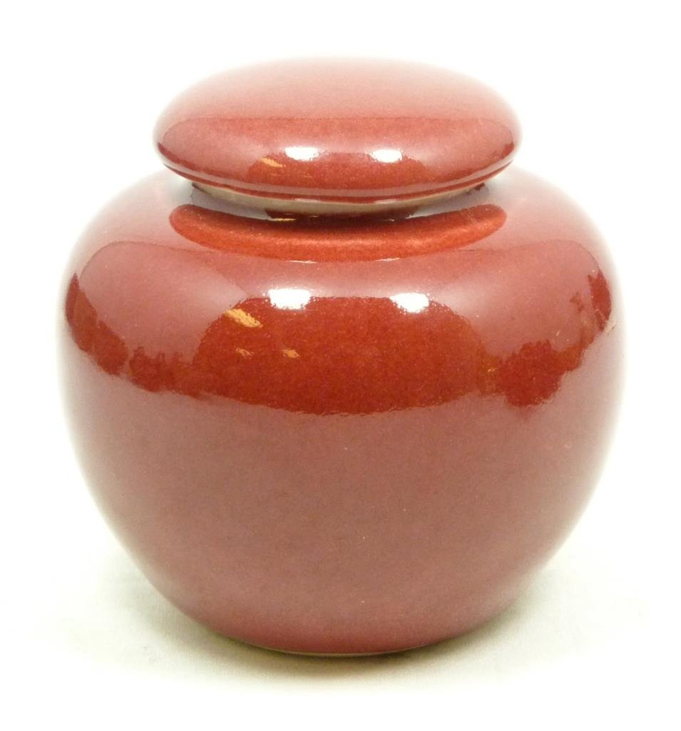 CHINESE PORCELAIN COVERED GINGER JAR: Rouge in color with 19th c. Ch'ing (Qing) Dynasty marking on bottom. Measures 3 1 /4"(8.5 cm) height.