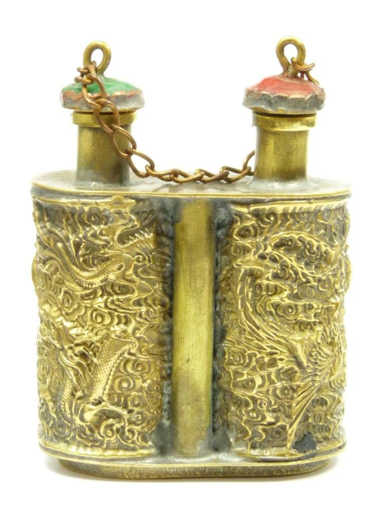 CHINESE SILVER DOUBLE SIDED EGG SNUFF BOTTLE: Chinese silver double sided egg figural snuff bottle. Calligraphy markings on bottom Measures 3" (7 cm) height. 89.7 grams.