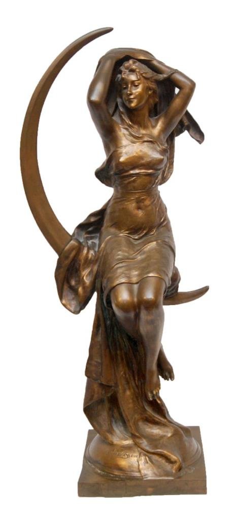 HENRI LEVASSUER BRONZE OF VENUS ON CRECENT MOON: Henri Louis Levasseur (French, 1853-1934) gilded bronze sculpture depicting the Goddess Venus seated on a Cresent moon. Signed H. LeVaSsuer to base. Also holds impress TIFFANY & CO mark to base. Early