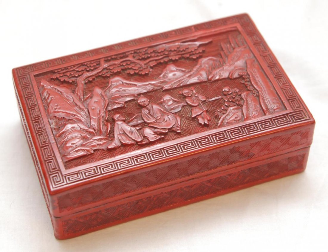 19th C CHINESE RED AND BLACK LACQUER CINNABAR BOX: Old Chinese relief cinnabar rectangular form box having red exterior and black interior and bottom. Qing Dynasty period, 19th century. Measures 1 5//8" height x 5 3/4" length x 3 5/8" depth (4.1cm x 1
