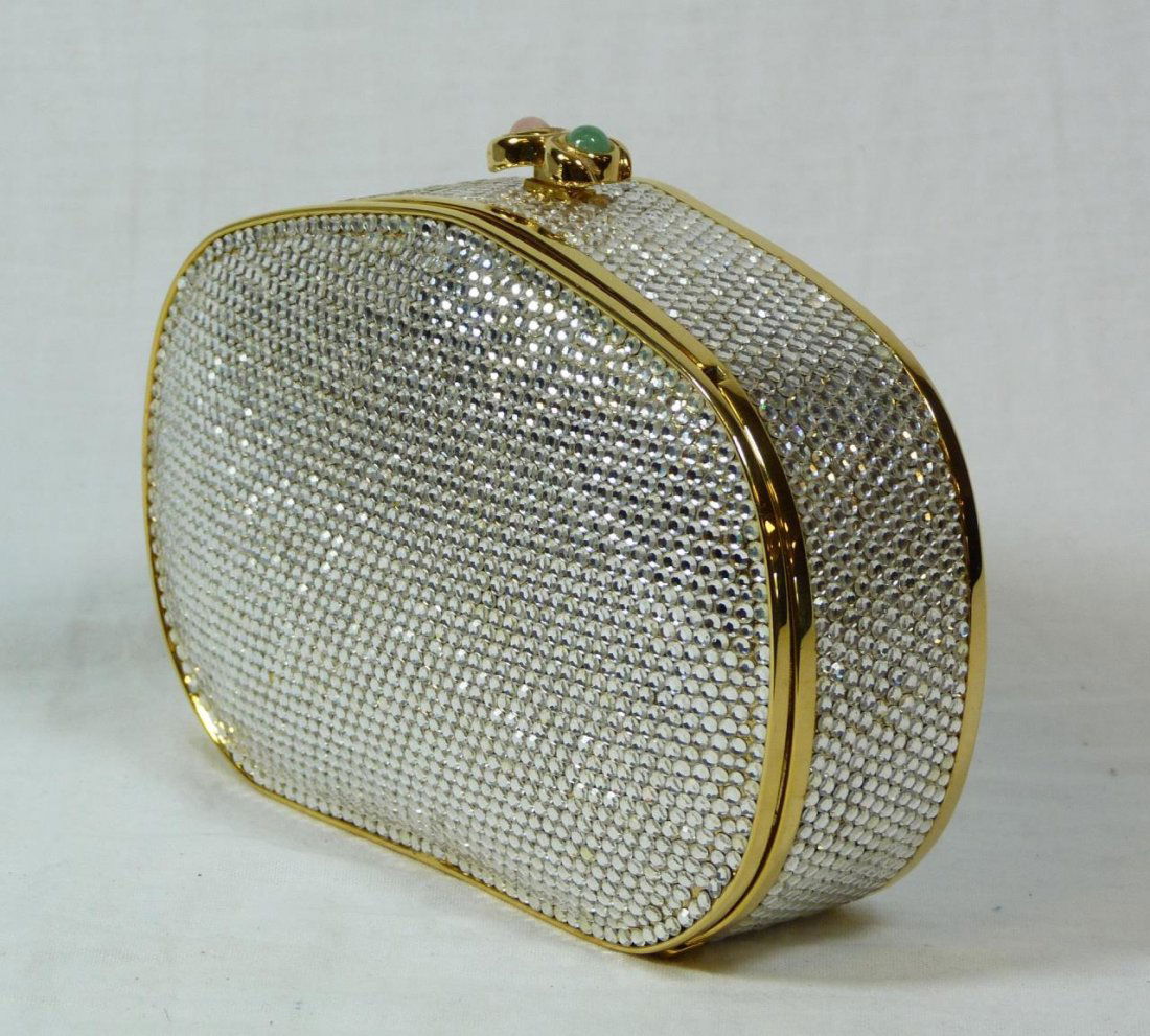 JUDITH LEIBER RHINESTONE EVENING CLUTCH PURSE: Judith Leiber evening clutch purse. Judith Leiber rhinestone clutch evening purse having two pink and green push button release and retractable chain strap, the interior fitted with a coin purse, gilt