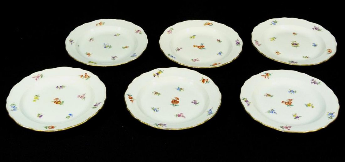 6 MEISSEN SCATTERED FLOWERS LUNCHEON PLATE: Lot of six Meissen hand painted German porcelain 'Scattered Flowers' luncheon plates. Each holding blue crossed swords marks to bottom. Circa 19th century. Each approx. 8 5/8" diameter (21.9cm). Total