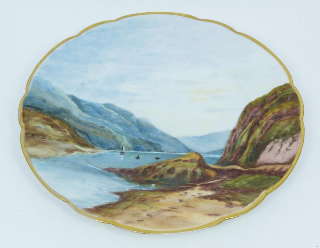 19th CENTURY LIMOGES FRENCH PORCELAIN SCENIC PLATE: Antique Haviland and Company Limoges hand painted scenic plate depicting a mountainous waterscape scene. Bottom holds green under glaze H & Co / L mark, circa late 1880's. Bottom also holds black 'K.B