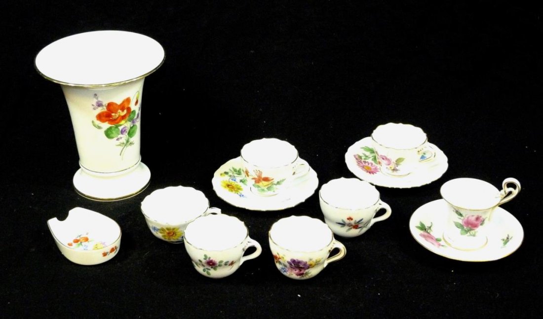 LOT OF 12 MEISSEN PORCELAIN FLORAL ITEMS: A lot of twelve miscellaneous antique Meissen German porcelain items including six demitasse cups, three saucers, one espresso cup, one vase and one small dish. 19th century. Tallest measures 6 3/8" h