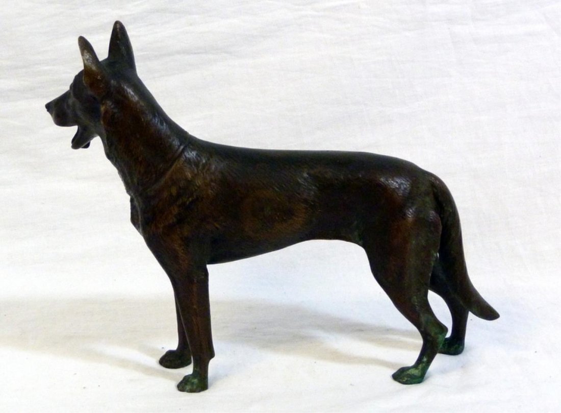 BRONZE FIGURE OF GERMAN SHEPHERD AFTER DILLER: A heavy Continental bronze sculpture depicting a standing German Shepherd after Fritz Diller (GERMAN, 1876-1946). First half of the 20th century. Measures 11" (27.5 cm) length and 9 5/8" 24.5 cm) heig