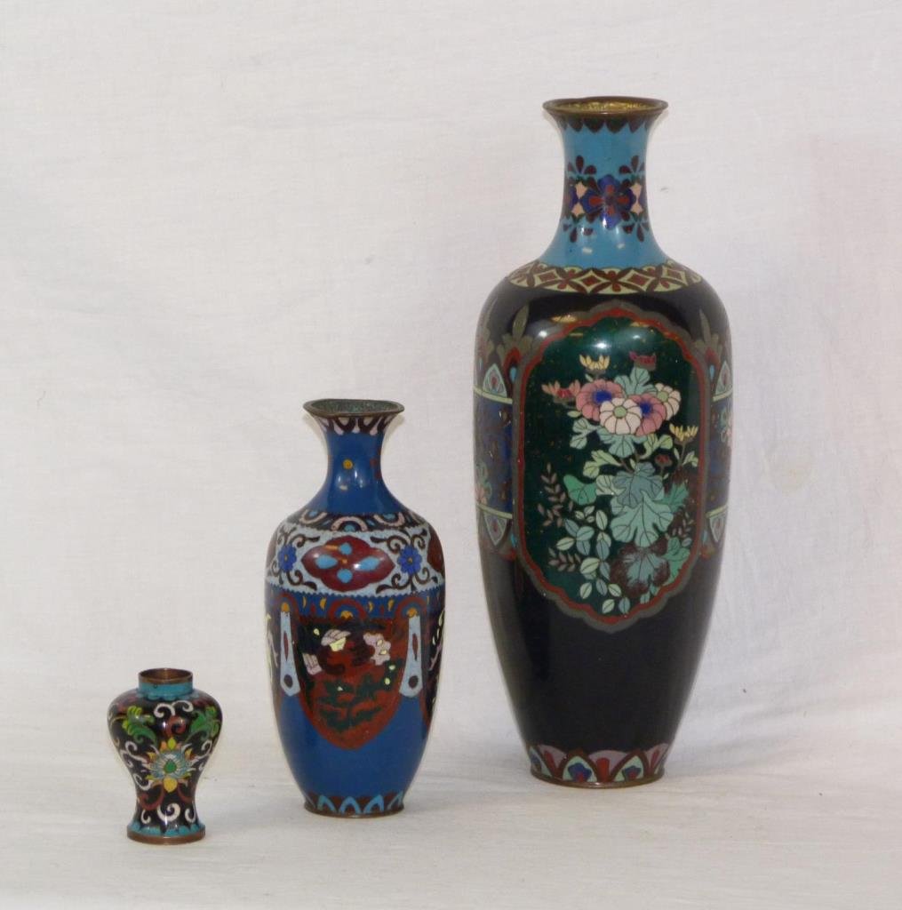 THREE ANTIQUE JAPANESE CLOISONNE VASES: Three antique cloisonne enameled metal vases having floral designs. Circa Meiji to Edo period, 19th century. Tallest measures 12 1/8" (30.7cm). Total weight of 813 grams.