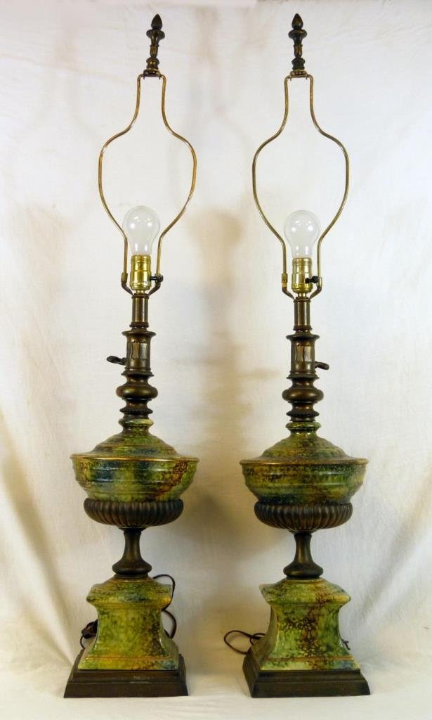 Pr GREEN & BROWN GLAZED BRONZE MOUNTED LAMPS: A pair of old green and brown glazed pottery and bronze mounted lamps. Key design to switch. First half of the 20th century. Each measures 42 1/2" height (107.9cm).