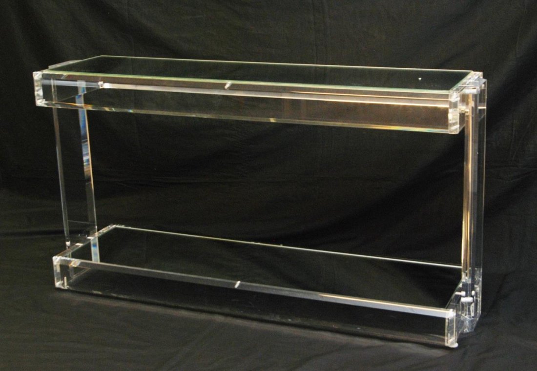 20th CENTURY LUCITE MIRROR SIDEBAR TABLE: A 20th century lucite sidebar table having a mirror top design. Measures 52" length x 28" height x 14" width (132.1cm x 71.1cm x 35.5cm).