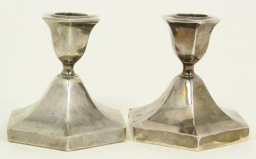Pr YUAN SHUN CHINESE STERLING SILVER CANDLESTICKS: A pair of Yuan Shun Chinese sterling silver candlesticks. Crafted in a hexagonal form. Holds impressed marks to bottom. 19th/20th century. Each measures approx. 3 1/4" height x 3 3/8" width (8.2cm x 8