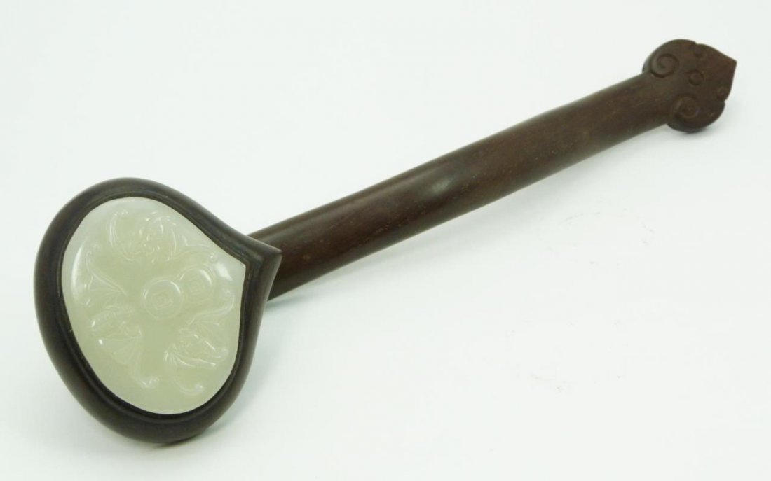 18th C WHITE JADE & ZITAN WOOD RUYI SCEPTER: Antique Chinese hand carved zitan wood and white jade ruyi scepter having figural lingzhi design. Raised carved design to jade depicting bats and coins. Glowing translucent even tone white jade stone.