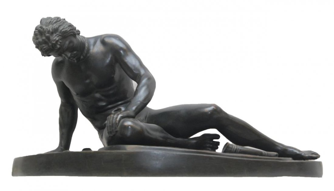 M. AMODIO 'LE GLADIATEUR BLESSE' BRONZE SCULPTURE: Michelle Amodio (ITALIAN, 19th century) bronze sculpture depicting a prone nude male on top of a shield with sword and sheath near his hand. Titled 'Le Gladiateur Blessé'. Brown patina. Signed 'A. Am