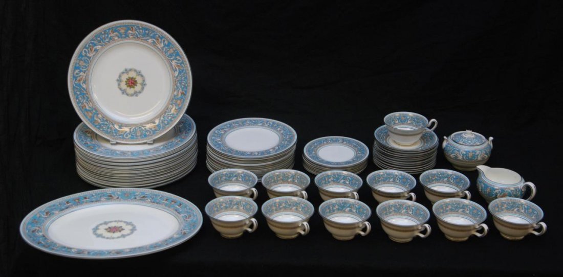 62pcs WEDGWOOD FLORENTINE TURQUOISE DINNERWARE: 62 pieces of Wedgwood English porcelain dinnerware pieces in the Florentine Turquoise pattern. Set includes 13 dinner plates (2 of the 13 do not have the center medallion) (10 7/8"), 14 salad plates (