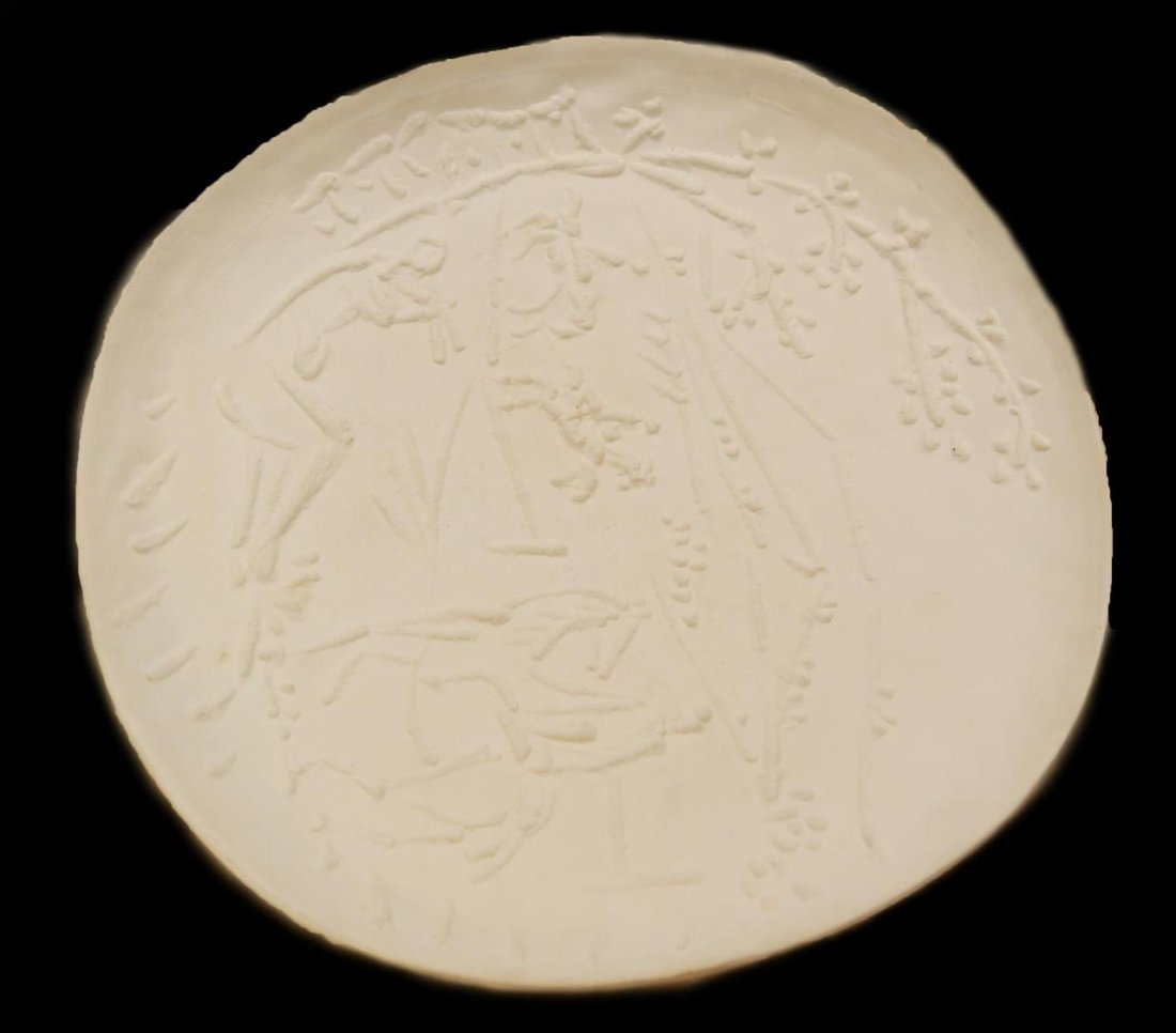 PICASSO MADOURA ORIGINAL ROUND CERAMIC PLATE: Pablo Picasso Madoura original round ceramic plate titled 'Joueur de Flute et Cavaliers' or 'Flute Player & Horsemen'. Mounted in shadow box. Measures approx. 13 1/4" diameter (33.6cm). Overall measur