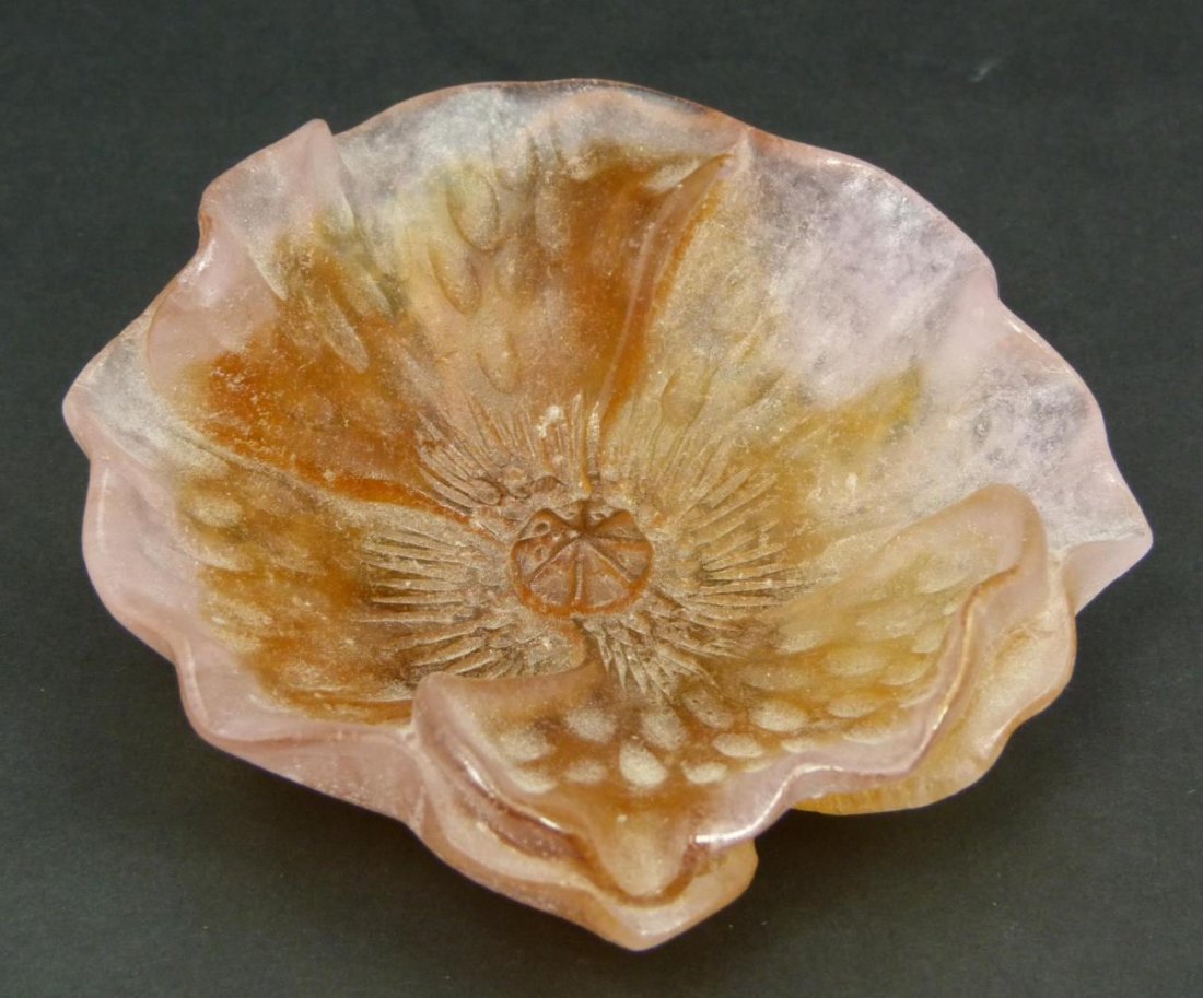 DAUM PATE DE VERRE ART GLASS 'HIBISCUS' DISH #1691: A Daum France Pate de Verre 'Fluer Hibiscus' dish having a figural floral design with pink to amber art glass colors. Number 1691. Signed Daum France to bottom. Includes original fitted box with paper