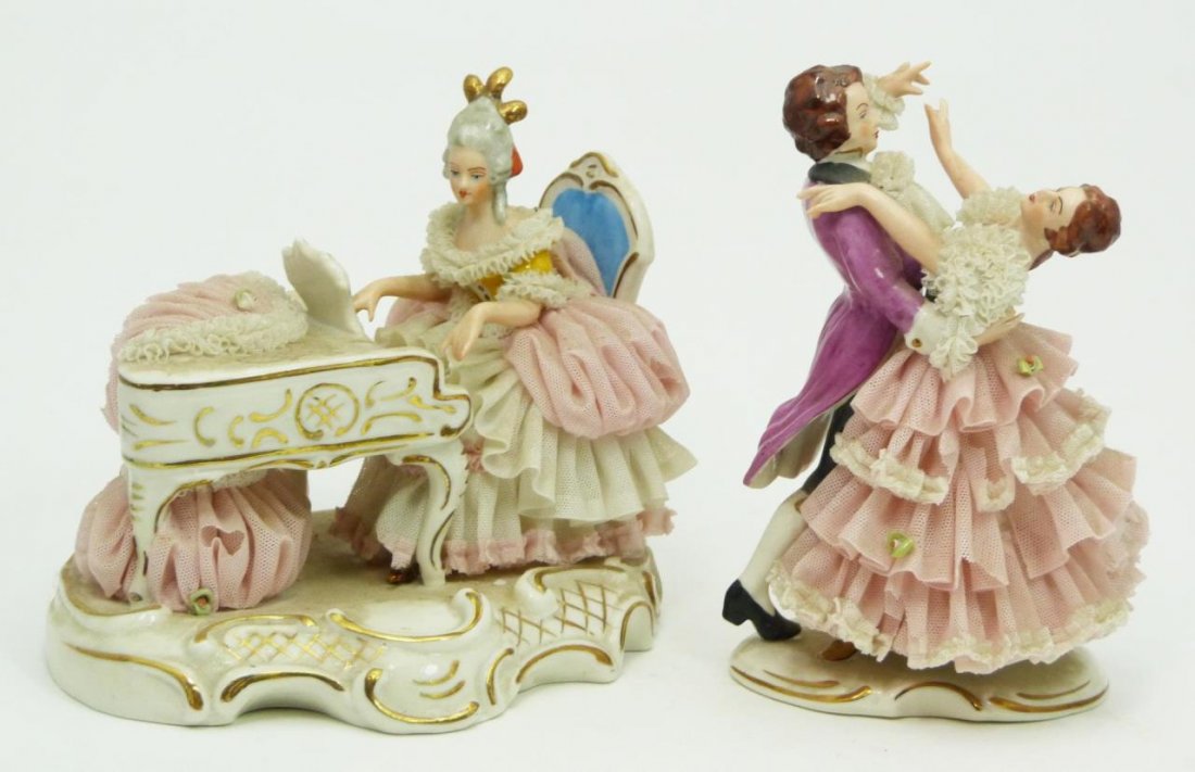 2 DRESDEN PORCELAIN FIGURAL DANCERS & PIANO PLAYER: A lot of two Dresden German lace porcelain figural groups, a woman playing piano and a couple dancing. Each hold blue Dresden marks to bottom. 19th/20th century. Tallest measures 6 1/8" height (15.5cm