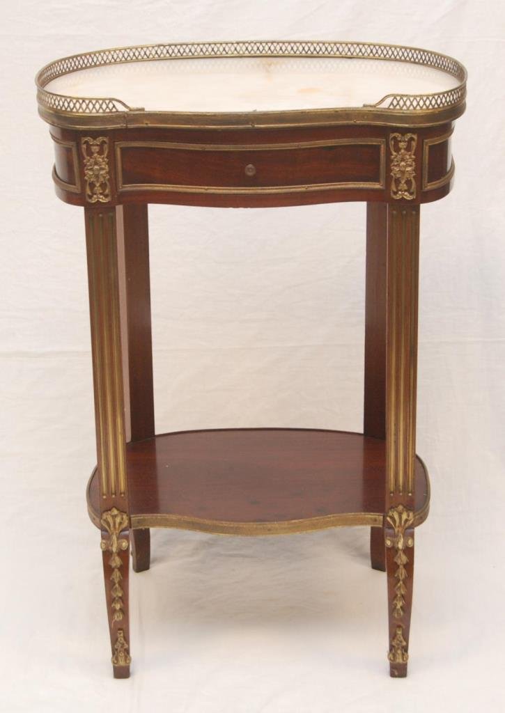 ANTIQUE FRENCH TWO TIER ONE DRAWER PEDESTAL TABLE: Antique French one drawer onyx top pedestal table surrounded by a gallery border and bronze mounts. Measures approx. 31" height x 20 1/2" width x 13 1/2" depth (79cm x 52.07 x 34.3cm). Provenance: Fro
