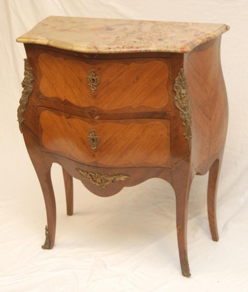 FRENCH FIGURAL BRONZE MOUNTED MARBLE TOP COMMODE: French marble top two drawer figural bronze mounted commode. Measures approx. 34 1/2" height x 28 1/2" width x 14 7/8" depth (85cm x 72.4cm x 37.8cm). Provenance: From the Estate of Count and Countess