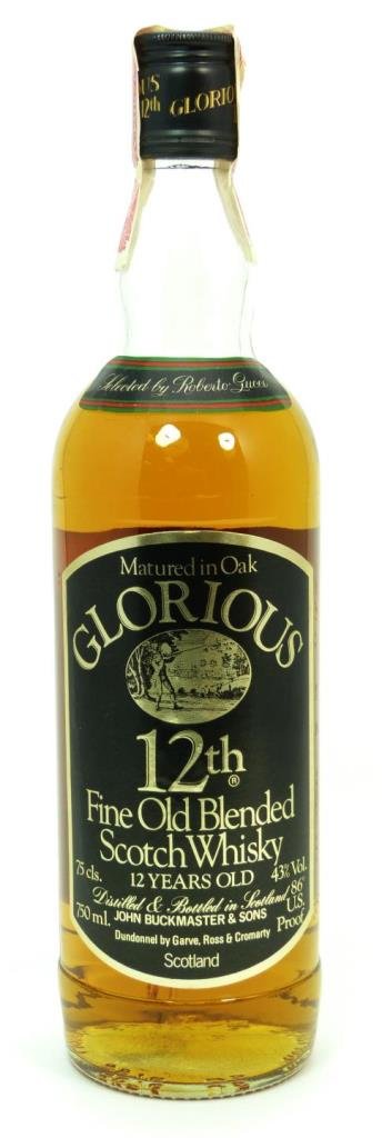 GLORIOUS 12TH GUCCI COMMISSIONED SCOTCH WHISKEY: A bottle of sealed Glorious 12th blended whiskey, bottled by John Buckmaster & Sons and selected by Roberto Gucci. Clear glass tall bottle with black label printed in gold. Black screw cap. Includes o
