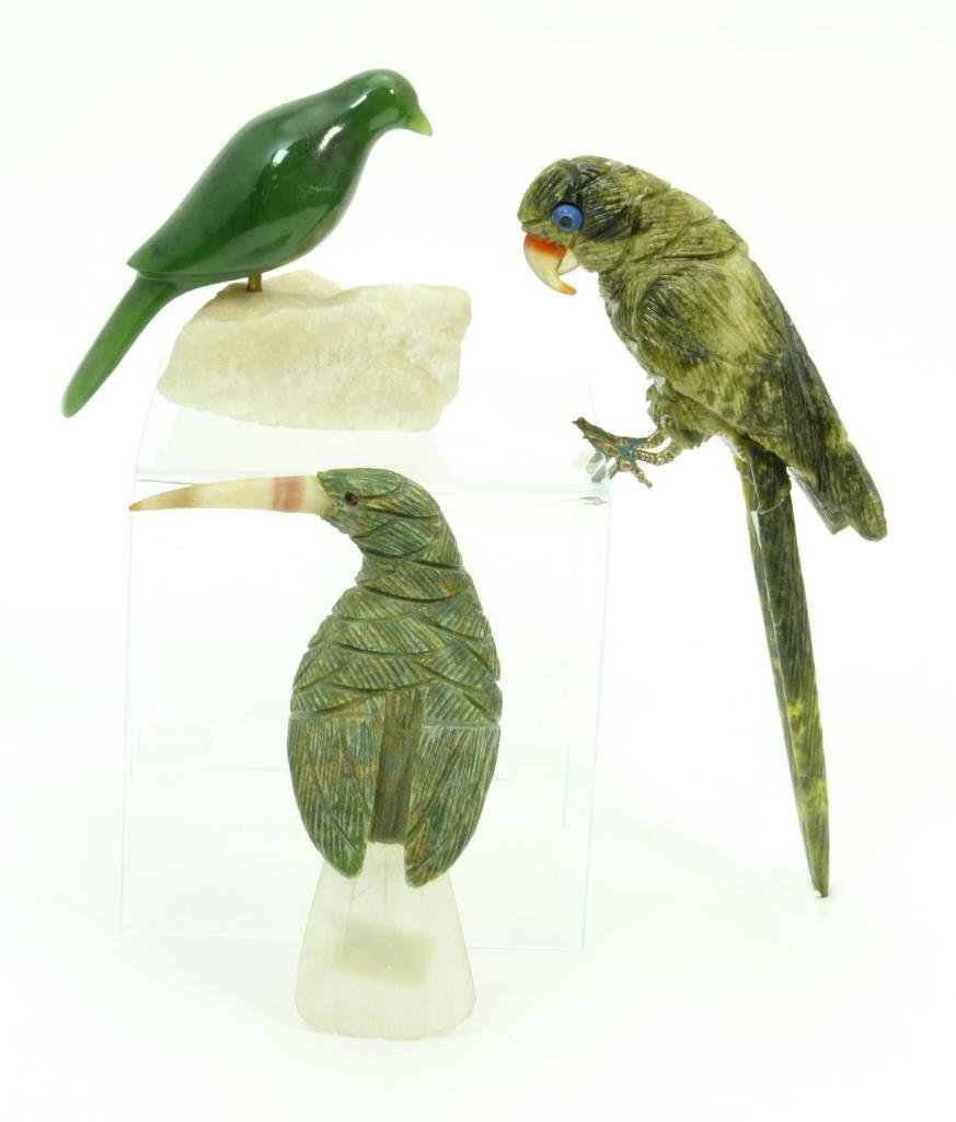 A LOT OF THREE BRAZILIAN CARVED STONE FIGURES: A lot of three Brazilian carved stone sculptures crafted with jade, quartz, and carnelian agate. Longest measures 5 1/4" (13.3cm). Total weight of 245 grams.