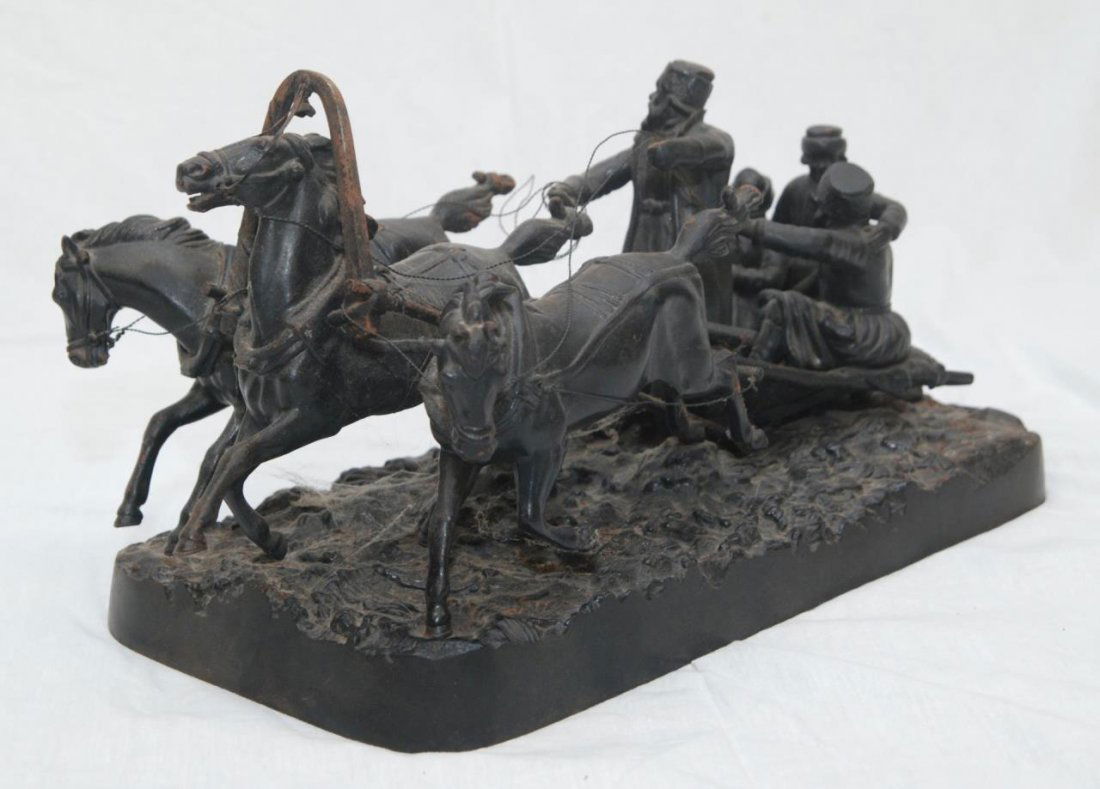 RUSSIAN BRONZE OF TROIKA SLED SCENE AFTER GRACHEV: A Russian crafted bronze sculpture depicting a Troika sled scene. Sled pulled by three horses and holding three passengers. Titled 'Winter Troika' after Vassili Grachev (RUSSIAN 1831-1905). Measures 1