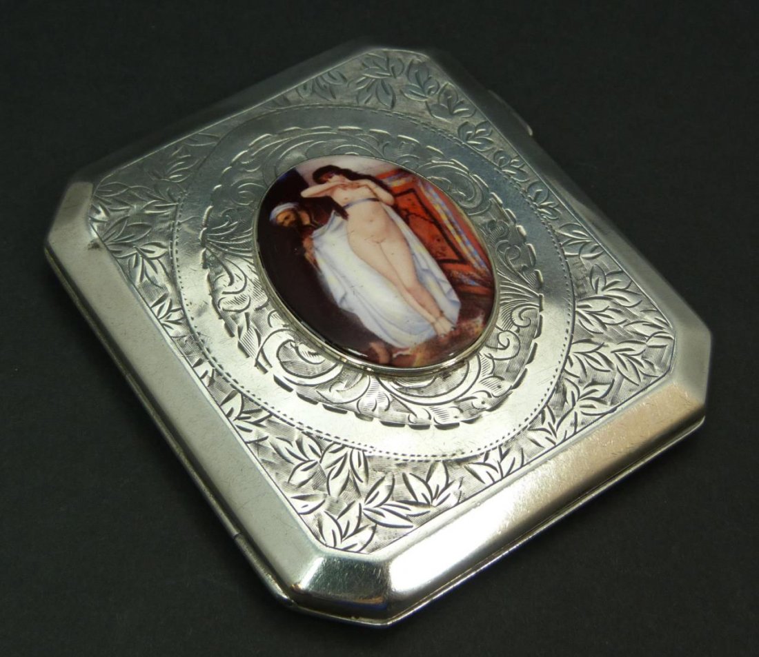 VINTAGE STERLING SILVER & PORCELAIN CIGARETTE CASE: mid century sterling silver English cigarette case, hand chased with hand painted oval porcelain plaque. case measures 3" x 3 1/2" (7.62cm x 8.89cm) with 1 1/2" center plaque witch depicts a nude woma