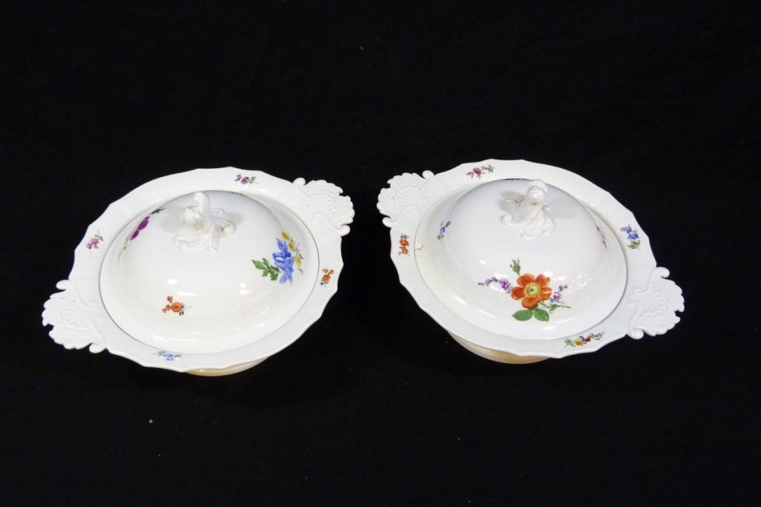 2 MEISSEN PORCELAIN BASKET WEAVE COV'D CASSEROLES: Two Meissen German porcelain basket weave design covered casserole serving bowls. Each holds blue under glaze crossed swords mark with dot used circa 1924-1933. Each approx. 7 1/4" height x 13 1/4" wi