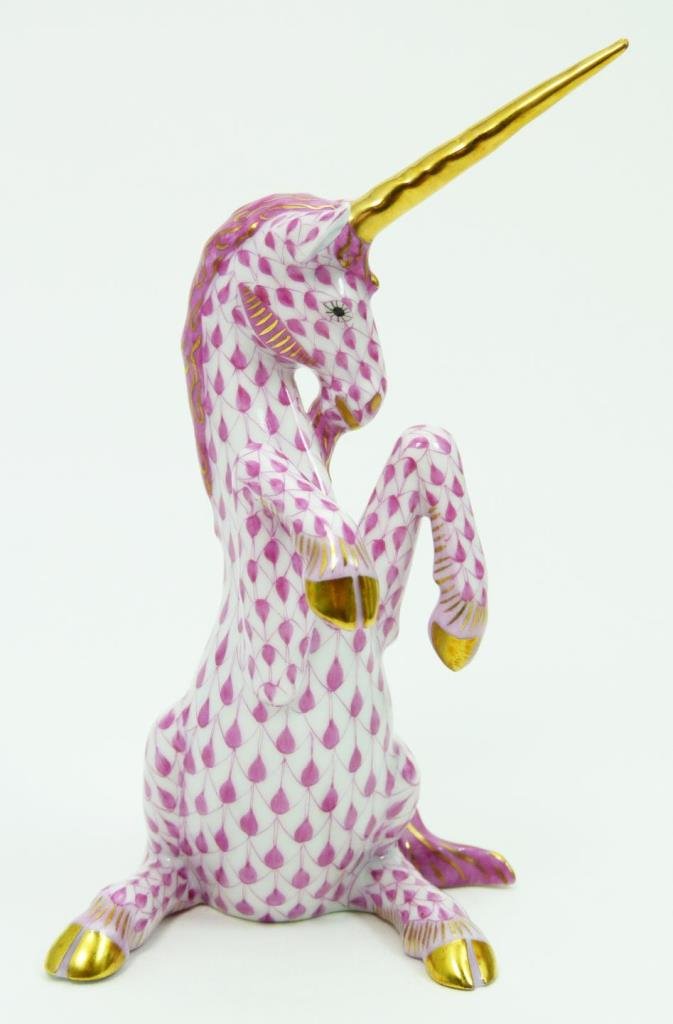 HERAND PINK FISHNET PORCELAIN UNICORN: HERAND PINK FISHNET PORCELAIN UNICORN measures 5" (12.7 cm) tall, pink fishnet with gold trim, and gol horn. blue herand stamp to base, total weight 80 gms