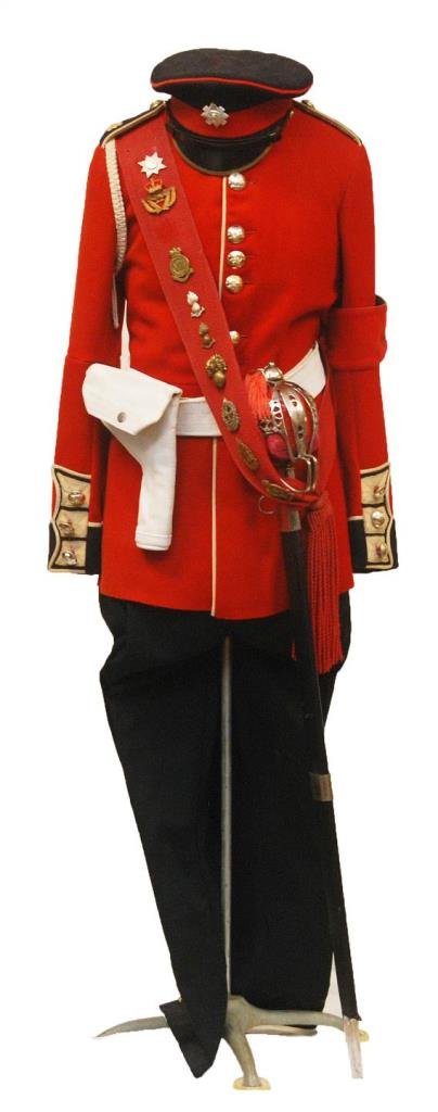 VINTAGE CANDIAN/ENGLISH DRESS MILITARY UNIFORM: VINTAGE CANDIAN DRESS MILITARY UNIFORM Mid century Royal Canadian/English dress jacket and pants comes complete with sash depicting numerous metals 1960's vintage hat and authentic saber and sheath un