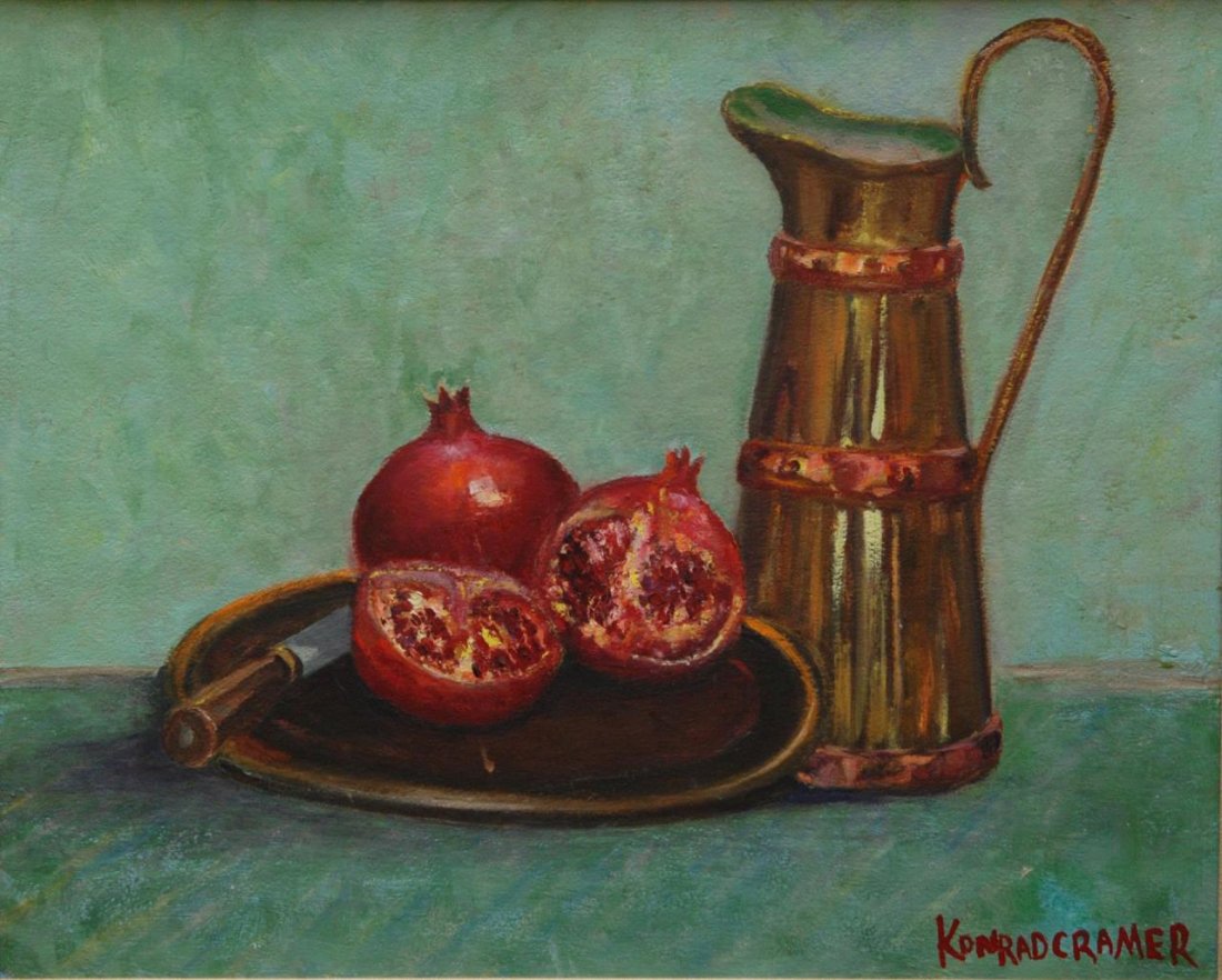 KONRAD CRAMER STILL LIFE OIL ON ARTIST BOARD: Konrad Cramer (AMERICAN/GERMAN, 1888-1963) oil painting on artist board depicting a still life scene with a round serving platter having cut pomegranates and knife next to a pitcher. Signed to lower r