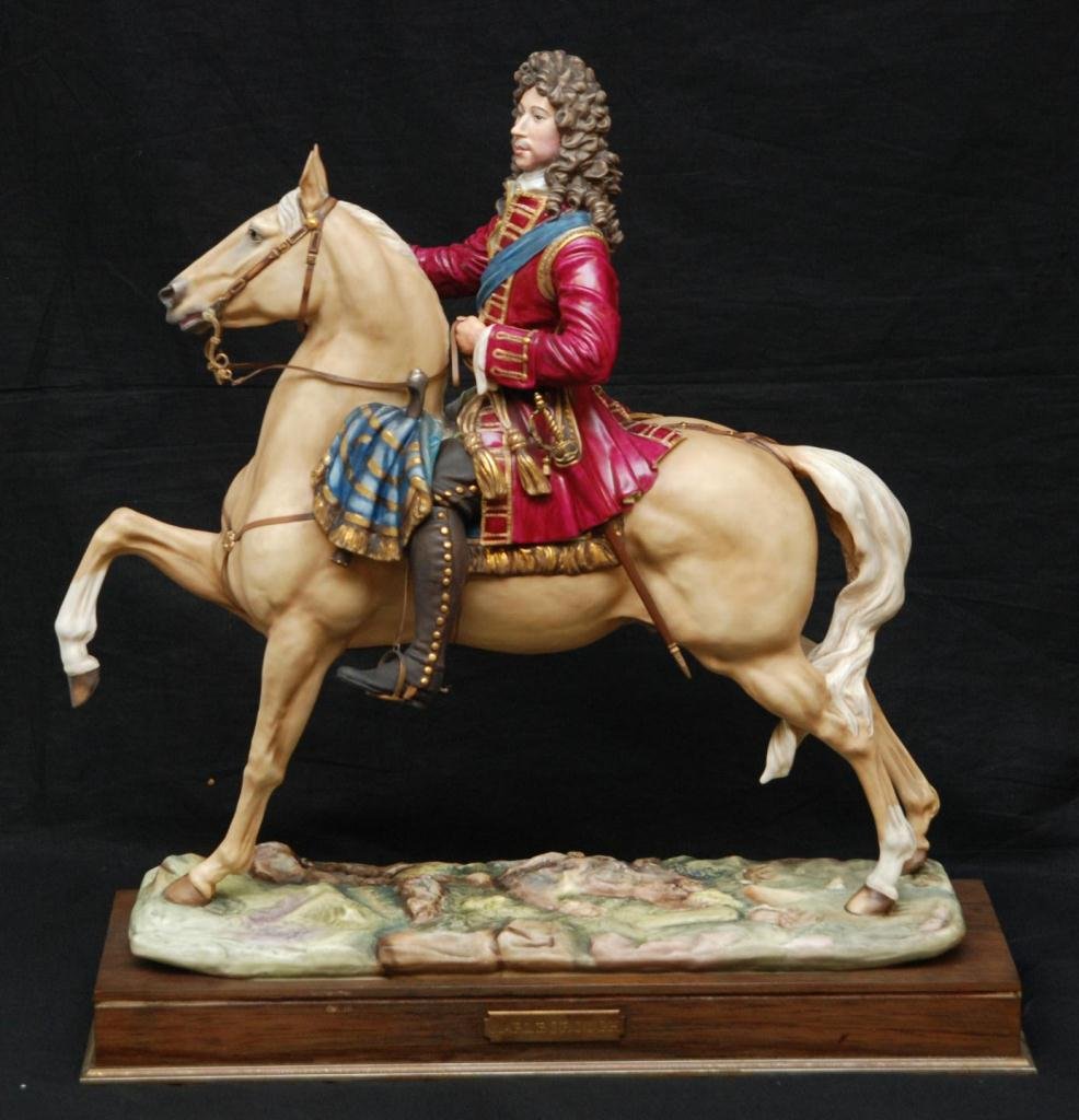 ROYAL WORCESTER 'MARLBOROUGH' PORCELAIN FIGURE: Royal Worcester English porcelain figure depicting the Duke of Marlborough on horseback with baton in right hand. Includes fitted wooden base with name plaque. Dated 1974 on bottom. Marked number 1 on