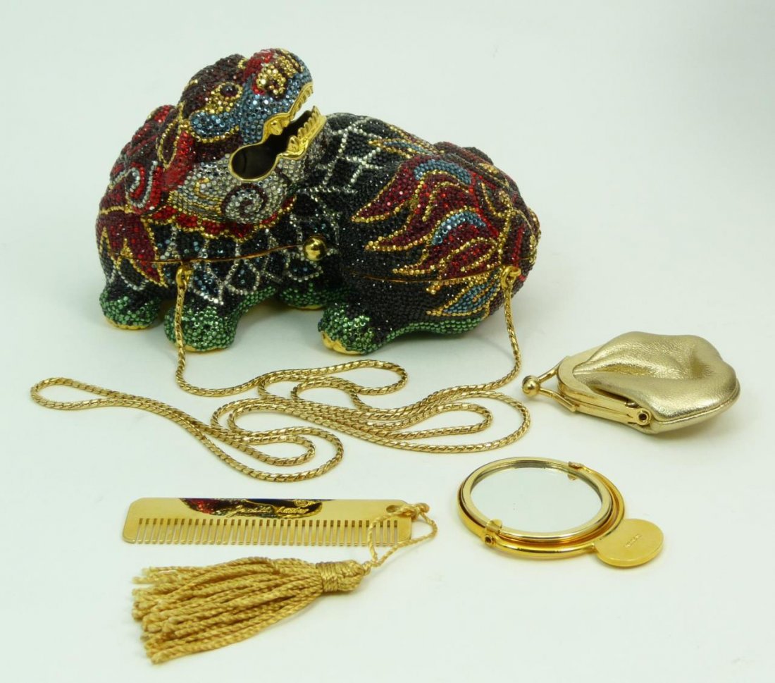 JUDITH LEIBER JEWELED FOO DOG MINAUDIERE: JUDITH LEIBER JEWELED FOO DOG MINAUDIERE Swarovski crystal foo dog in multi colors. Measures 6" wide (15.24cm) in like new condition. Comes with original mirror and change purse, carry in bag and box.
