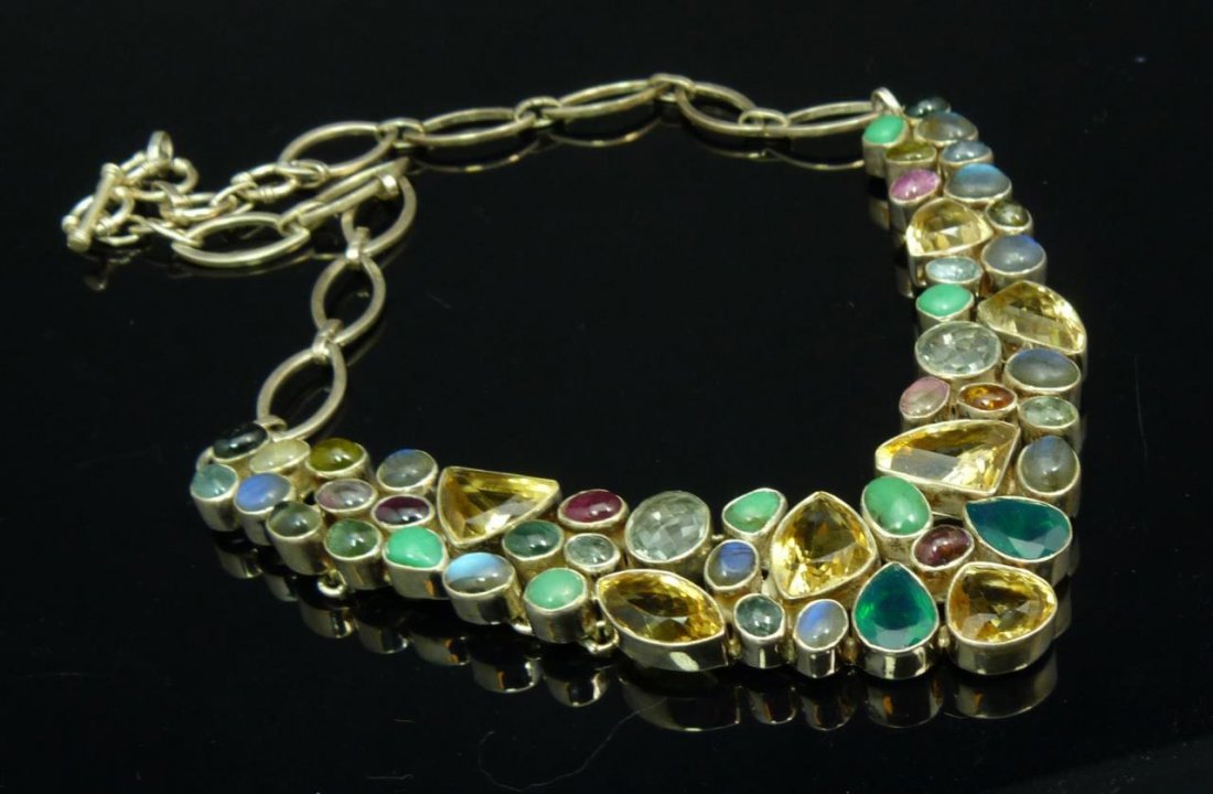 HEAVY STERLING AND SEMI PRECIOUS STONE NECKLACE: HEAVY STERLING AND SEMI PRCIOUS STONE NECKLACE With, jade, citrine, moonstone, tourmaline, on 925 sterling 16"(40.64cm) chain, total weight 111g