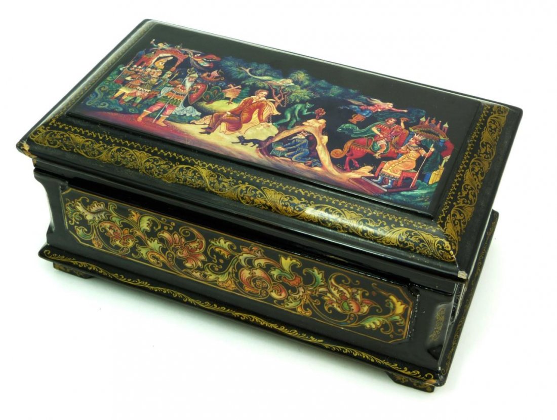 LARGE RUSSIAN LACQUERED MUSIC BOX: LARGE RUSSIAN LACQUERED MUSIC BOX Plays Laras theme from Dr. Zhivago. Box is decorated in antique Russian soldiers and floral display on black lacquered ground. Measures 9" across (22.86cm) x 6" wide 
