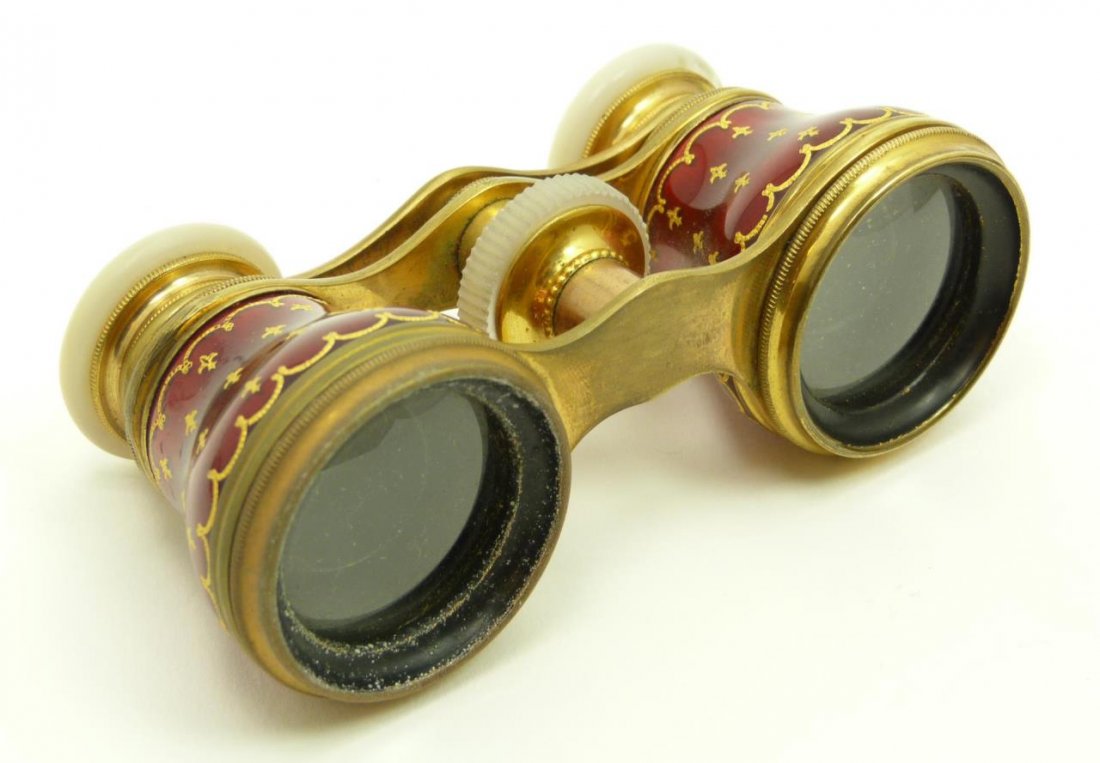 EXQUISITE PR OF ANT FRENCH ENAMEL OPERA GLASSES: EXQUISITE PR OF ANTIQUE FRENCH ENAMEL OPERA GLASSES Measures approx 4" long (10.16cm) Beautiful ruby enameling with gold trim mother of pearl eye piece. Circa 1930. Total weight 163g