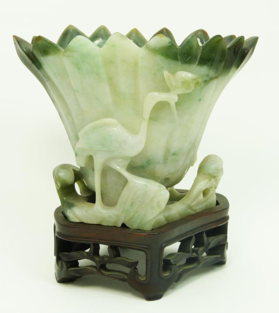 VINTAGE CARVED JADE LIBATION CUP: VINTAGE CARVED JADE LIBATION CUP. Decorated with swans, white & green jade. Measures 4" tall (10.16cm) x 6" wide (15.24cm) comes with fitted base. Early to mid 20th century. Total weight 1101g