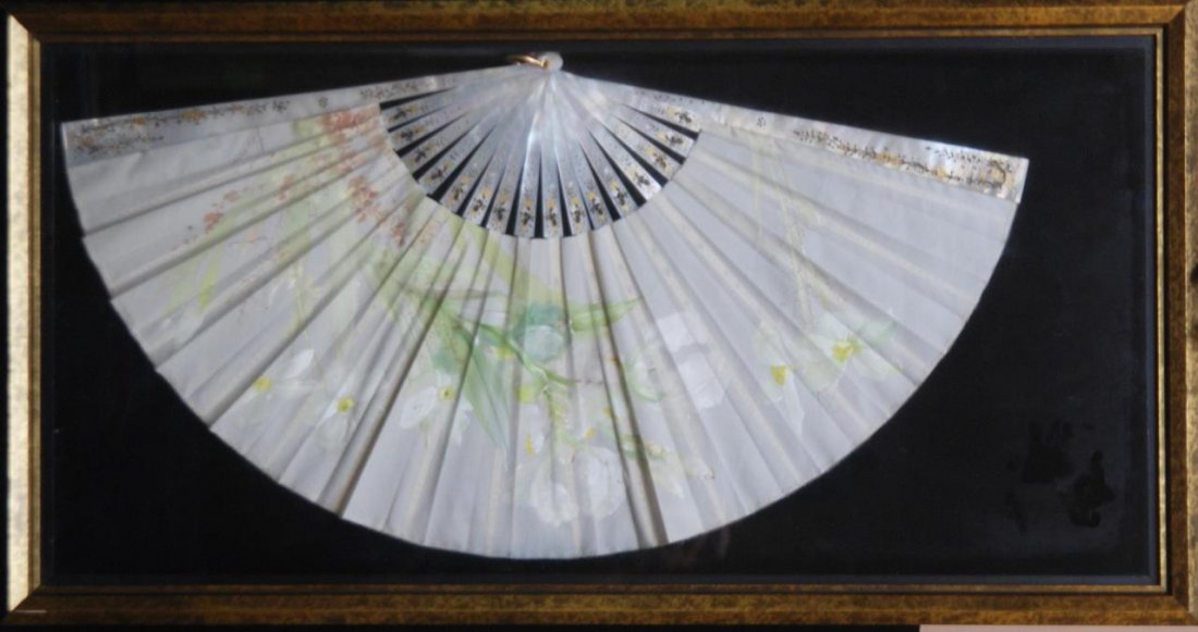 EXQUISITE MOHTER OF PEARL FAN IN SHADOWBOX FRAME: EXQUISITE MOHTER OF PEARL FAN IN SHADOWBOX FRAME Mother of pearl fan with a hand painted floral scene. Shadow box measures 31" width (78.74cm) x 15-1/2" length (39.37cm) x 2-1/2" depth (6.35). Fan ope